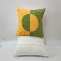 Front and back detail view of a yellow and green geometric pattern decorative pillow case - Sage Green Patchwork