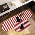 Red and white striped leather kitchen mat set featuring a cute black cat design. - Oval Cartoon Stripe Style C / 40*60cm