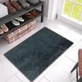 Detail view of dark grey shaggy absorbent non-slip doormat in a home entryway setting - 40*60cm / Navy Blue