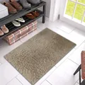 Close-up detail of a tan shaggy peach velvet floor mat in a modern home entryway. - 40*60cm / Light Camel
