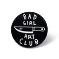 Black round enamel pin badge with Bad Girl Art Club lettering and a knife design - BAD GIRL Round Brooch (JEWB-A005-03-02)