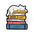 Kawaii enamel pin featuring a white cat sleeping on a stack of colorful books with text - Book Coffee Cat Brooch (JEWB-A005-22-04)