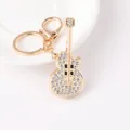 Creative gold metal guitar keychain with sparkling rhinestones for car and bag accessories - 6915 Guitar