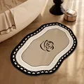 Elegant non-slip bathroom bath mat with black rose pattern in cream and black finish - 30x50cm (Upgraded Thickened Diatom Mud) / Luxury Chanel Style C (Irregular Cloud Shape)