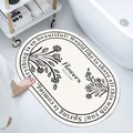 Soft diatom mud absorbent bath mat with floral design and motivational text - Richness & Elegance (Oval) / 40*60cm
