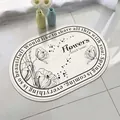 Oval lamb velvet bath mat with floral patterns and spring-themed English quotes. - 40*60cm / Elegant Floral (Oval)