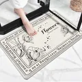 Detailed view of soft lamb velvet non-slip bathroom mat featuring elegant black floral print - 40*60cm / Elegant Floral (Rectangular)
