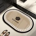 Tapis de bain ovale de luxe avec logo rose et texte Elegant, absorbant et antidérapant - 30x50cm (Terre de Diatomée Épaissie) / Style Chanel de Luxe B (Ovale)
