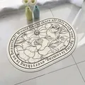 Floral oval lamb fleece bathroom floor mat with elegant black rose line art and quote - 40*60cm / Layered Woods (Oval)