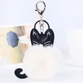 Süßer Katzen-Schlüsselanhänger aus Kunstpelz mit weißem flauschigem Körper und schwarzen Ohren - Katze-Beige