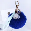 Blauer Kunstfell-Pom-Pom-Schlüsselanhänger mit Stoffblume und elegantem Schleifenband - Stoffblume - Königsblau
