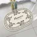 Oval lamb velvet bathroom mat with floral design and Spring is coming text - 40*60cm / Mountain Cherry in the Wind (Oval)
