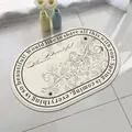Oval lamb wool bathroom mat with floral design and 'Spring is coming' text - 40*60cm / Flower Art (Oval)