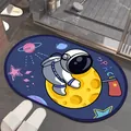 Detail view of cartoon astronaut space themed absorbent diatom mud bathroom mat - 40x60cm / Flag Astronaut