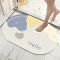 Absorbent soft diatom mud bath mat with 'Hello' print being used in an indoor bathroom. - Simple - Purple