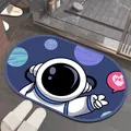 Oval absorbent diatom mud bathroom mat with cute cartoon astronaut and planet design - 40x60cm / Yes Astronaut