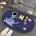 Oval diatom mud bath mat with cute astronaut and space theme in navy blue - 40x60cm / HI Astronaut