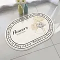 Non-slip oval lamb fleece bathroom mat with floral design and Spring & Summer text - 40*60cm / Xiangyu Zuiqiu (Oval)