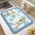 Hoogwaardige absorberende keukenmat met blauw bloemenpatroon en tekstbedrukking - Kleine Bloem Lichtblauw