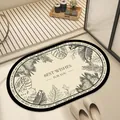 Minimalist oval absorbent bathroom mat with botanical monstera print and Best Wishes text - Plant Leaves (FUQS-D) / 40*60cm
