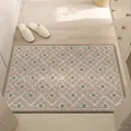 Detailed view of a pinkish geometric silk loop entrance door mat in a home hallway. - 40*60cm / Flower Style