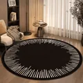 Modern round area rug with black and white radial pattern in a cozy living room setting. - Diameter 50CM / Linear Black