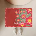 Tapis de bain antidérapant absorbant avec motif de lapin floral rouge et vert imprimé - Série Rouge