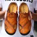 Close-up view of brown leather men's closed-toe outdoor travel and beach sandals - 38 / 898 Yellow Brown