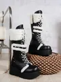 Gedetailleerd overzicht van zwarte platform snowboots met witte bontrand en veters - 36 / Zwart