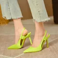 Detail view of lime green satin pointed-toe slingback high heels on model - 35 / Fluorescent Green (Yellow)