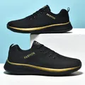 Detail of breathable black flying woven sneakers featuring stylish gold trim accents. - 36 / Black & Gold