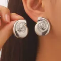 Elegant silver-colored conch shell stud earrings for a stylish beach vacation look - Spiral Conch Style (K-552) / Silver