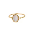 Elegant detailed close-up of a vintage gold beaded ring featuring an oval white stone - Adjustable / White Cat's Eye Style (G122881G-2)