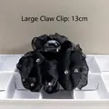 Large 13cm black satin hair claw clip featuring shimmering star rhinestones and cloud design - White Rhinestone Decor