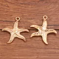 Paar goldene Seestern-Anhänger aus Legierung für DIY-Schmuck mit realistischer Ozean-Textur - Seestern-Form (Nr. 26) / 34x35mm