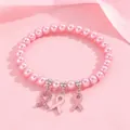 Bracelet élégant en perles roses avec breloques ruban pour la lutte contre le cancer - Bracelet en Perles Roses / Rose
