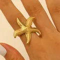 Adjustable gold starfish ring with embossed dot texture for summer vacation style - Starfish Style (DZ-251) / Gold