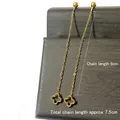 Elegant gold chain tassel earrings featuring a flower pendant with length measurements - 6cm Hollow Clover Tassel / Gold