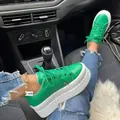 Detail shot of vibrant green platform sneakers worn in a car lifestyle setting - 35 / Green