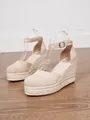 Side view of closed-toe wedge sandals with braided hemp rope platform and ankle strap - 34 / Apricot