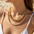 Close-up detail of a bold gold geometric layered choker necklace worn by a model - Gold Double-layer Geometric Spiky Style (33044-nek-G-EP)
