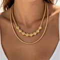 Close-up of golden geometric choker set with textured beads and sleek snake chain. - Gold Double-layer Geometric Spiral Style (33042-nek-G-EP)
