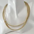 Stylish gold-tone triple layered geometric metal choker necklace for fashion - Triple-layer Geometric Wavy Style (33141-nek-G-EP) / Gold