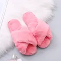 Close-up of soft pink plush cross-strap slippers on a white faux fur rug - 36 / Watermelon red
