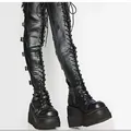 Detail of black goth lace-up over-the-knee platform boots with buckle straps. - 35 / Black