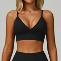 Black V-neck yoga sports bra with thin adjustable straps and ribbed fabric for fitness - Premium Black