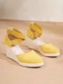 Sandalias de cuña amarillas cerradas con suela de cuerda de esparto y tiras elásticas. - 34 / Amarillo