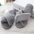 Detailed macro view of plush grey cross-band house slippers on a soft white rug - 36 / Gray