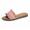 Detail view of pink suede flat slide sandals featuring an elegant ruffled strap design - 35 / Watermelon red