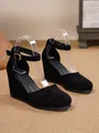 Elegant black suede closed-toe wedge sandals with an adjustable ankle strap detail - 34 / Black